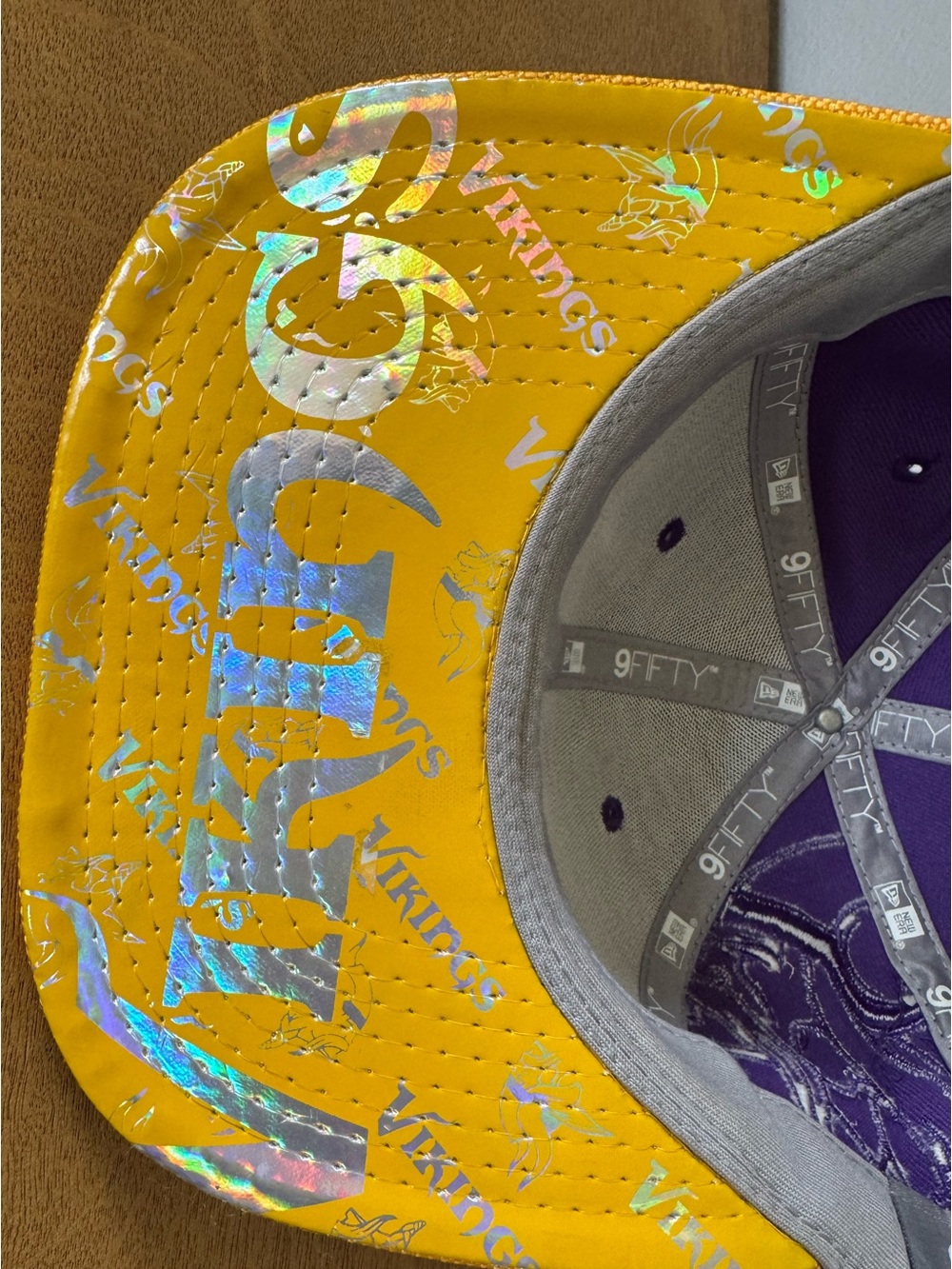 Minnesota Vikings New Era 9Fifty SnapBack with Holographic Logo under brim